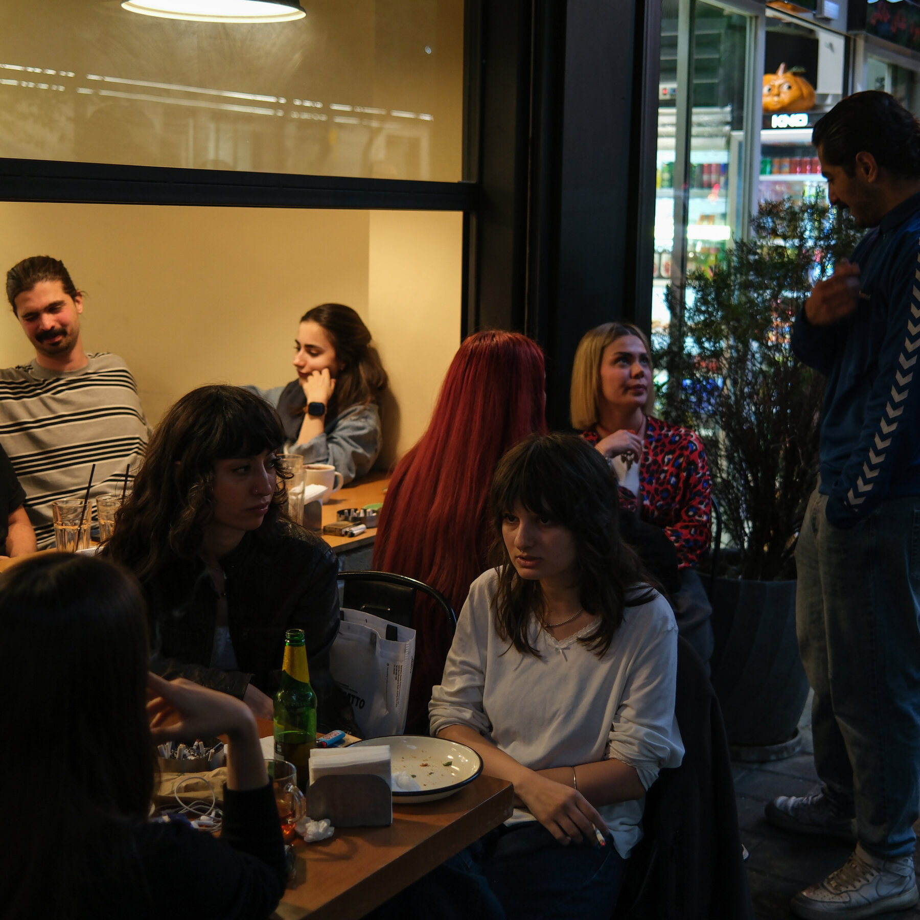 In Packed Cafes, Iranians Yearn to Escape War’s Wreckage