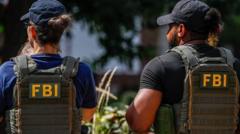FBI investigates claim by hackers they stole data on all agency staff