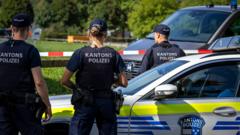 Manhunt after shooting at Swiss rave kills woman, 22, and injures five