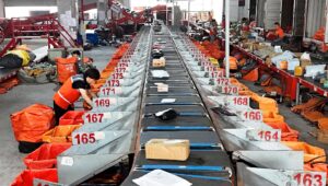 China's express deliveries top 100 billion ahead of last year's pace, signaling steady consumer demand