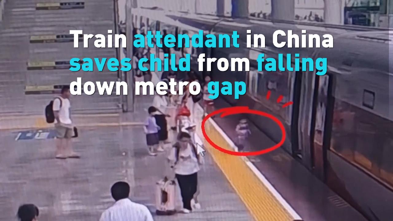 Train attendant in China saves child from falling down metro gap