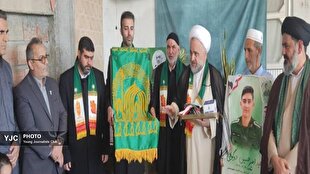 دیدار خادمان حرم مطهر رضوی با خانواده شهید امیرحسین دوگونچی در آق قلا