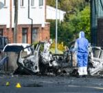 Man charged after explosion at Dunmurry police station
