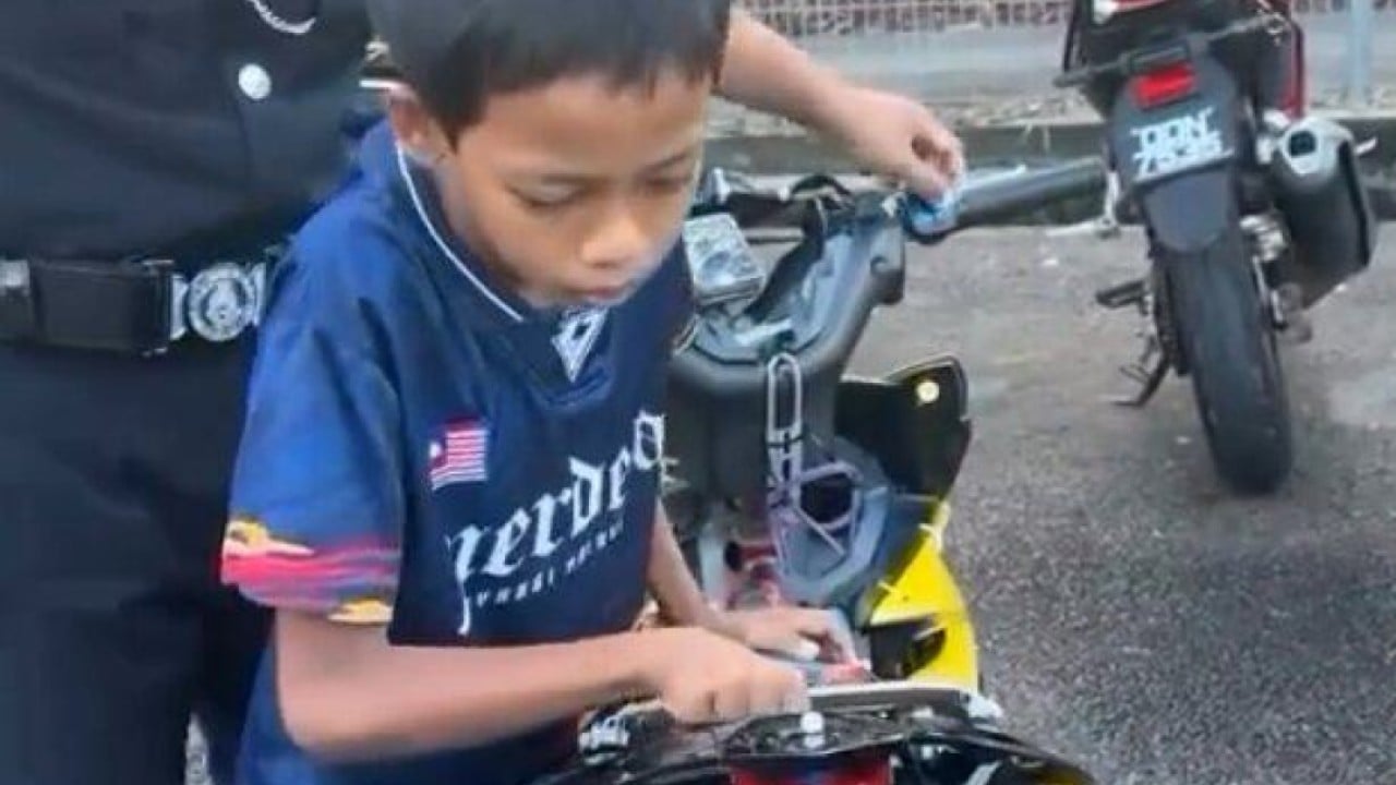 Too young to ride, Malaysian teen pedals dream by building fake Yamaha motorcycle