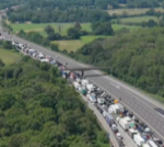 Ten in hospital as traffic stranded on M25 in heat
