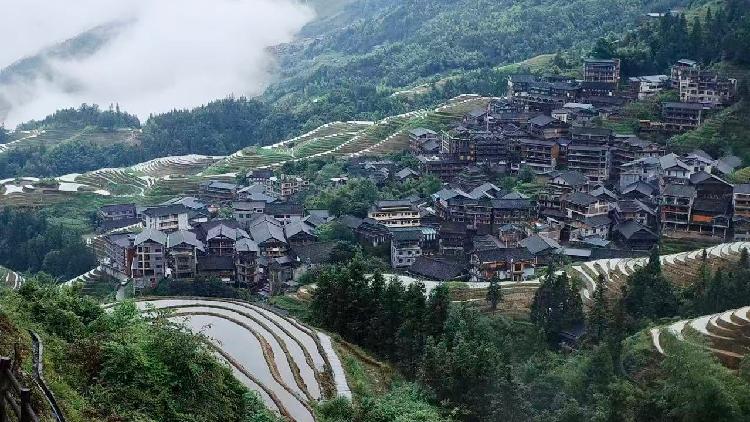 A village hidden deep in the Longji Rice Terraces