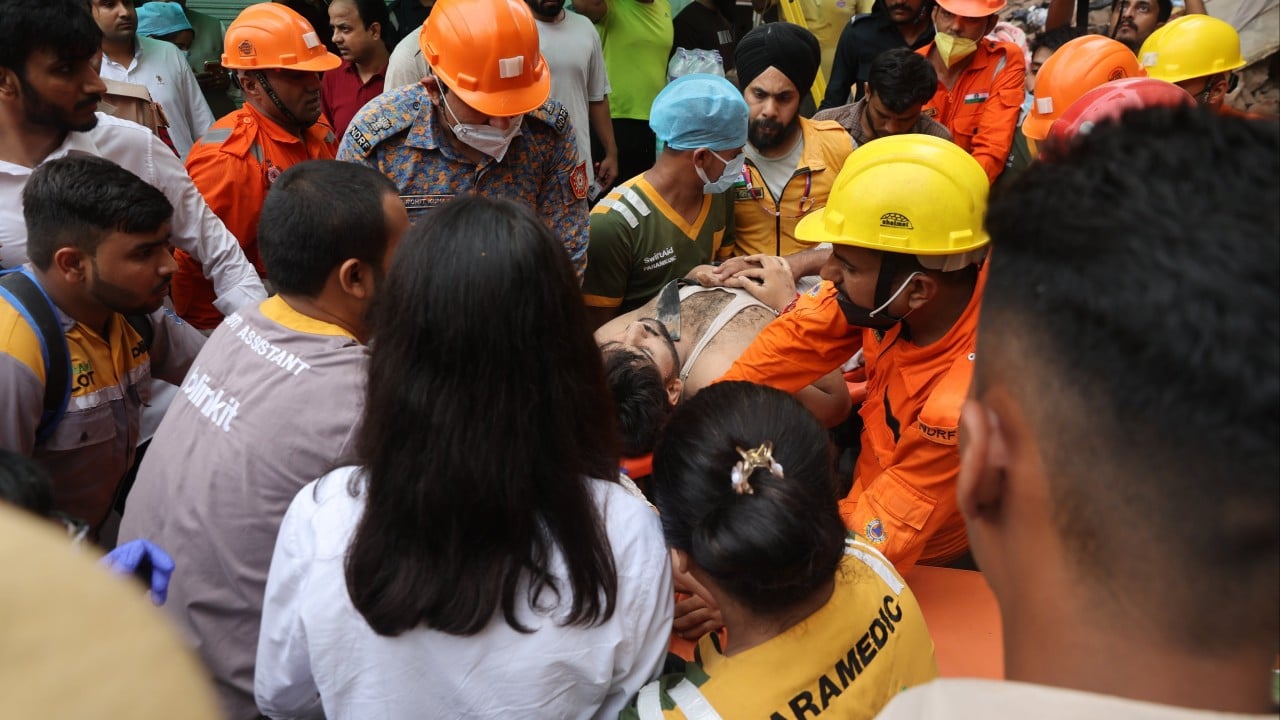 New Delhi building collapse kills 3, traps dozens