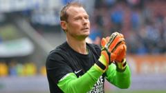 Former Arsenal goalkeeper Alex Manninger dies after car struck by train in Austria