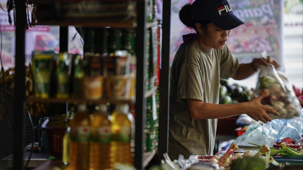 Philippine poverty falls to record low, but many still feel insecure