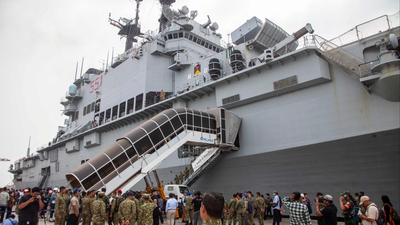 Indonesia commissions first aircraft carrier, bolstering sea defence