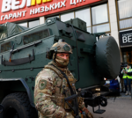 At least six killed in Kyiv as gunman opens fire and takes hostages