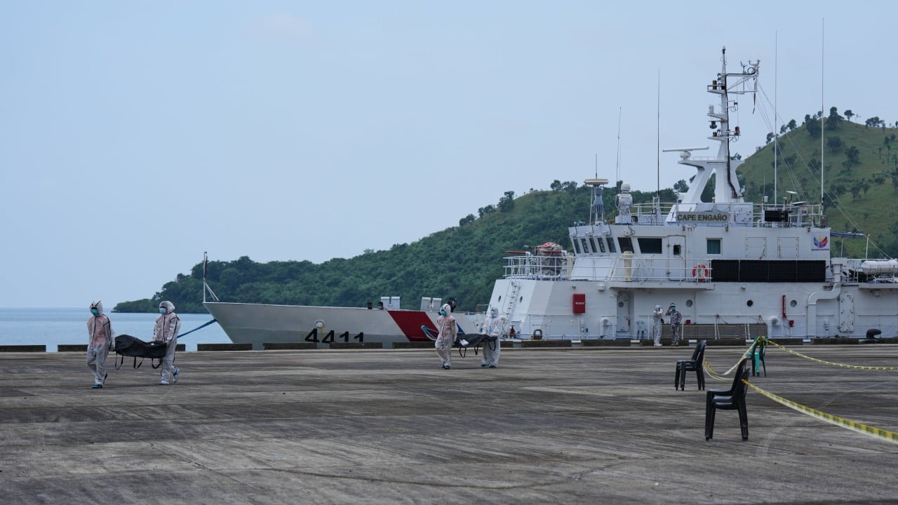 Bodies from Philippine ferry arrive at port after fire killed at least 35