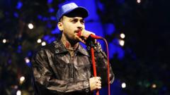 Zayn Malik cancels US tour and cuts UK dates after hospital bed photo shared