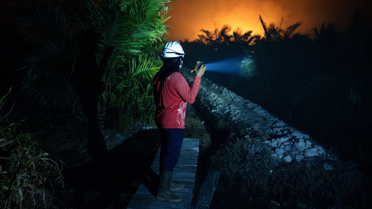 When Indonesia burns, these women run towards the fire