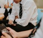 Phones to be banned in schools by law in England under government plans