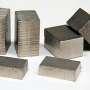 Iron and cobalt both curb stainless invar expansion, but iron leads