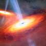 Two blazing quasars caught waltzing into a merger